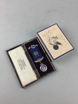 Lot 189 - A RANGERS F.C. KEYRING AND AN ENAMELLED SILVER MASONIC BADGE