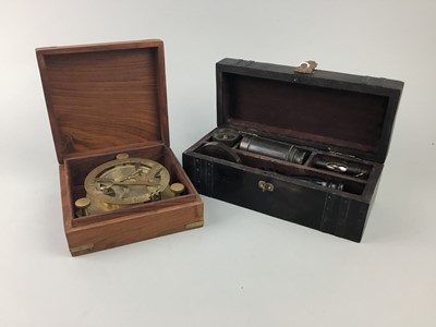 Lot 77 - A BRASS COMPASS IN A WOOD BOX AND A NAUTICAL INSTRUMENT SET
