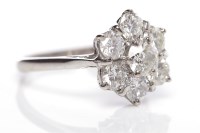 Lot 118 - DIAMOND CLUSTER RING of floral form, the seven...