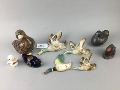 Lot 368 - A GRADUATED SET OF THREE FLYING DUCKS AND OTHER CERAMIC FIGURES OF DUCKS