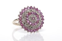 Lot 123 - RUBY AND DIAMOND DRESS RING the bezel of...