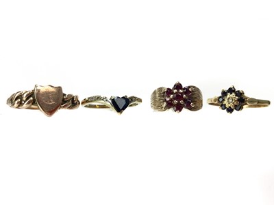 Lot 950 - THREE GEM SET RINGS AND ONE OTHER