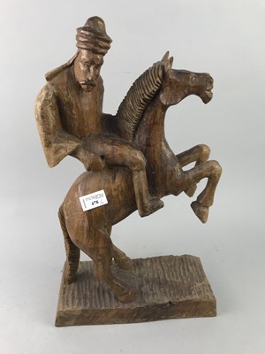 Lot 478 - A CARVED WOOD FIGURE OF A MALE ON HORSEBACK AND THREE FIGURES OF BIRDS