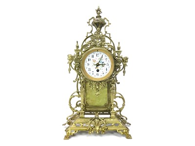 Lot 1140 - AN EARLY 20TH CENTURY FRENCH GILT METAL MANTEL CLOCK