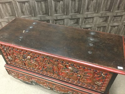 Lot 801 - AN EARLY 20TH CENTURY INDONESIAN CARVED WOOD DOWRY CHEST