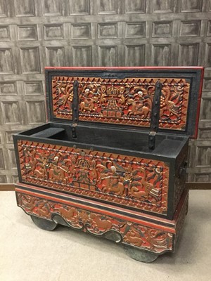 Lot 801 - AN EARLY 20TH CENTURY INDONESIAN CARVED WOOD DOWRY CHEST