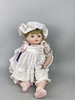 Lot 512 - A MODERN PORCELAIN DOLL AND A VINTAGE MICKEY MOUSE HAND PUPPET