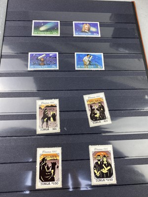 Lot 220 - A LOT OF FOUR ALBUMS OF WORLD STAMPS