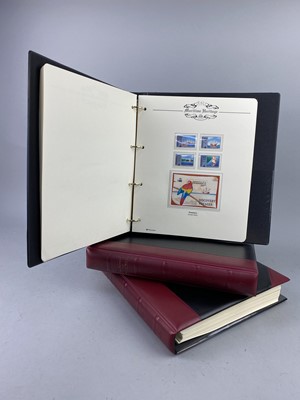 Lot 230A - A LOT OF THREE ALBUMS OF STAMPS, COINS AND FIRST DAY COVERS