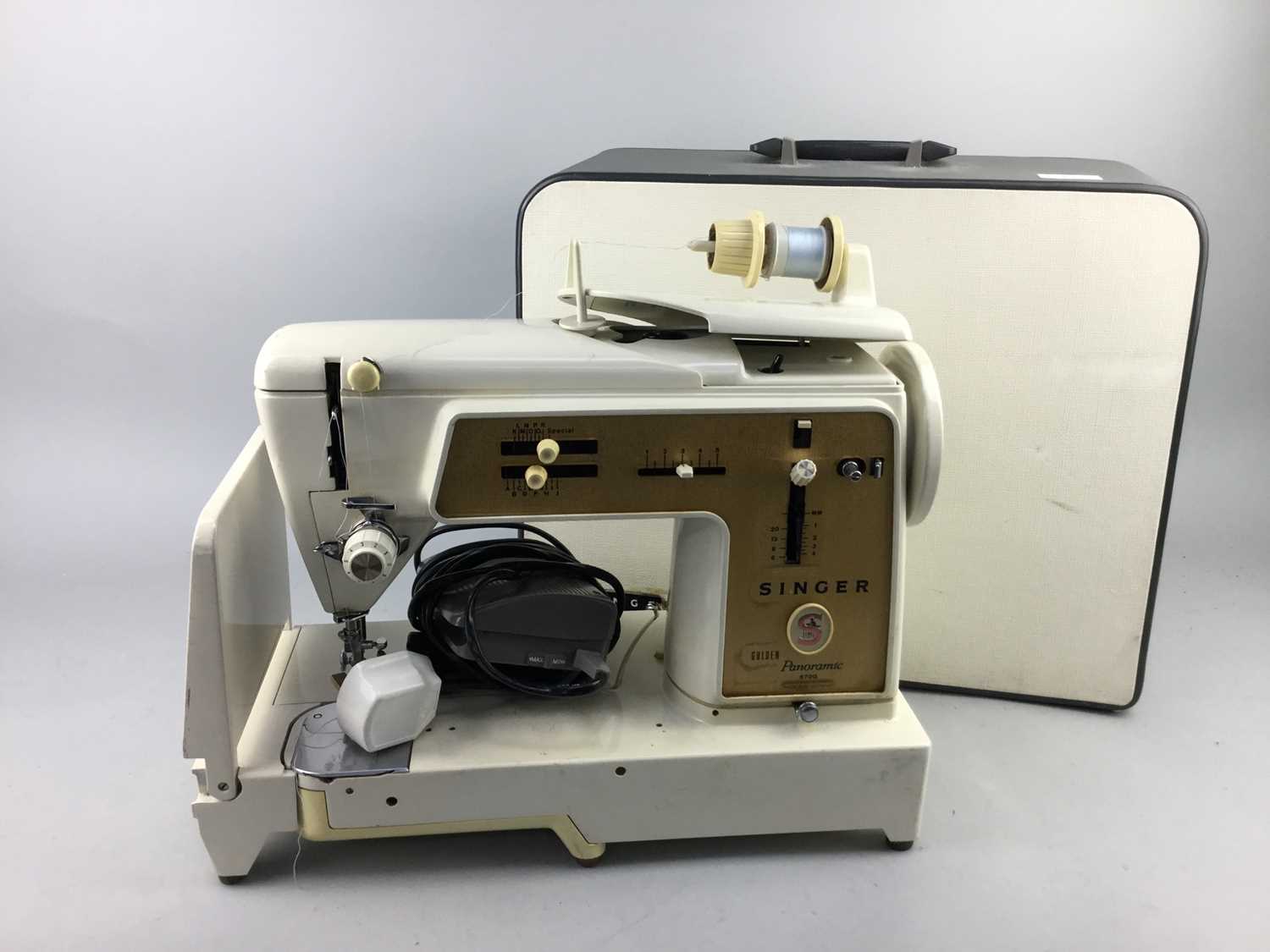 Lot 300 - A CASED SINGER SEWING MACHINE AND ANOTHER