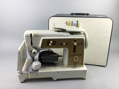 Lot 300A - A CASED SINGER SEWING MACHINE AND ANOTHER