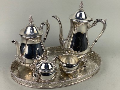 Lot 320A - A SILVER PLATED FOUR PIECE TEA SERVICE AND AN OVAL TRAY