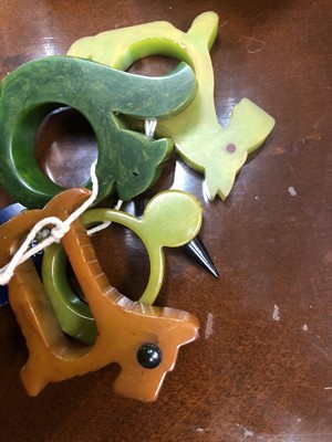 Lot 526 - EIGHT ART DECO BAKELITE NOVELTY NAPKIN RINGS