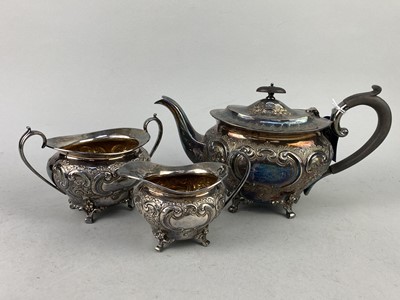 Lot 530 - A SILVER PLATED THREE PIECE OVAL TEA SERVICE AND FISH SERVERS