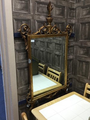 Lot 560 - A GILT FRAMED WALL MIRROR