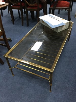 Lot 558 - A GLASS TOPPED COFFEE TABLE