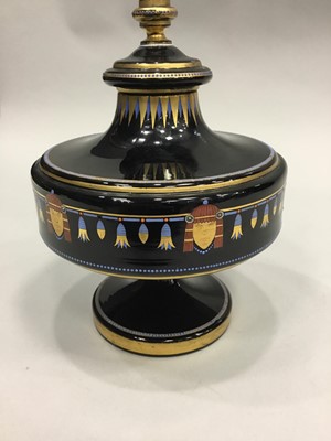 Lot 1036 - A CONTINENTAL EGYPTIAN REVIVAL GLASS URN AND COVER