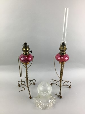 Lot 60 - A PAIR OF FRENCH OIL LAMPS ALONG WITH A FIRE GUARD
