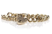 Lot 181 - NINE CARAT GOLD BRACELET formed by curb links,...