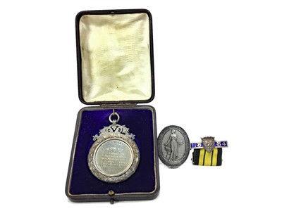 Lot 1461 - AN EDWARDIAN SILVER DRAUGHTS MEDAL ALONG WITH ANOTHER MEDAL AND A CLASP
