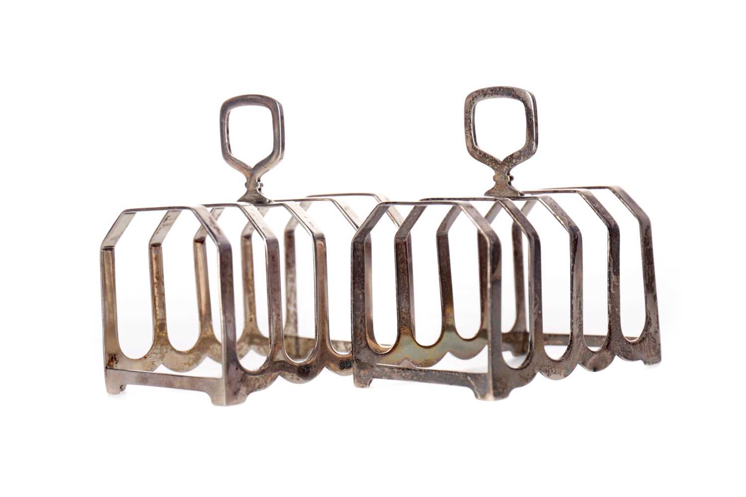 Lot 497 - A PAIR OF FOUR DIVISION TOAST RACKS