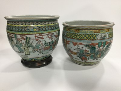 Lot 710 - A MATCHED PAIR OF EARLY 20TH CENTURY CHINESE FAMILLE VERTE FISH BOWLS/PLANTERS