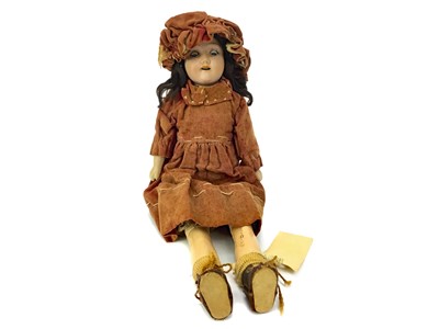 Lot 1463 - A 19TH CENTURY GERMAN BISQUE HEADED DOLL