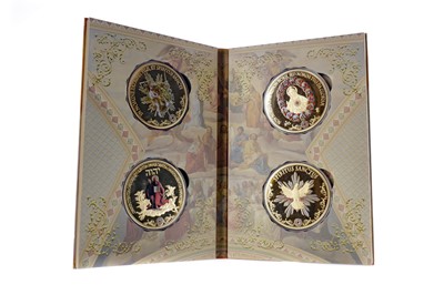 Lot 50 - TRINITAS HARDBACK FOLIO AND A GOLD PLATED ONE SHILLING COIN