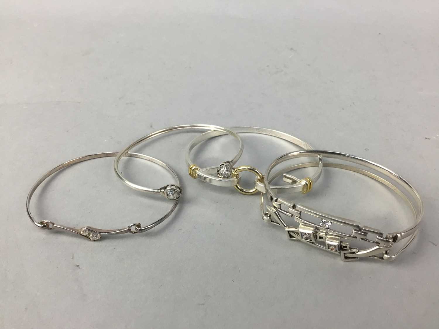 Lot 14 - A LOT OF FOUR SILVER BANGLES