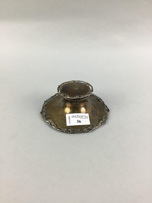 Lot 36 - AN EARLY 20TH CENTURY SILVER CIRCULAR INKWELL
