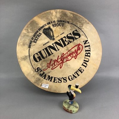Lot 42 - A GUINNESS ADVERTISEMENT BODHRUM DRUM WITH A TOUCAN