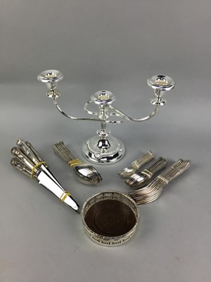 Lot 32 - A SILVER PLATED TWIN BRANCH CANDLABRUM ALONG WITH CUTLERY