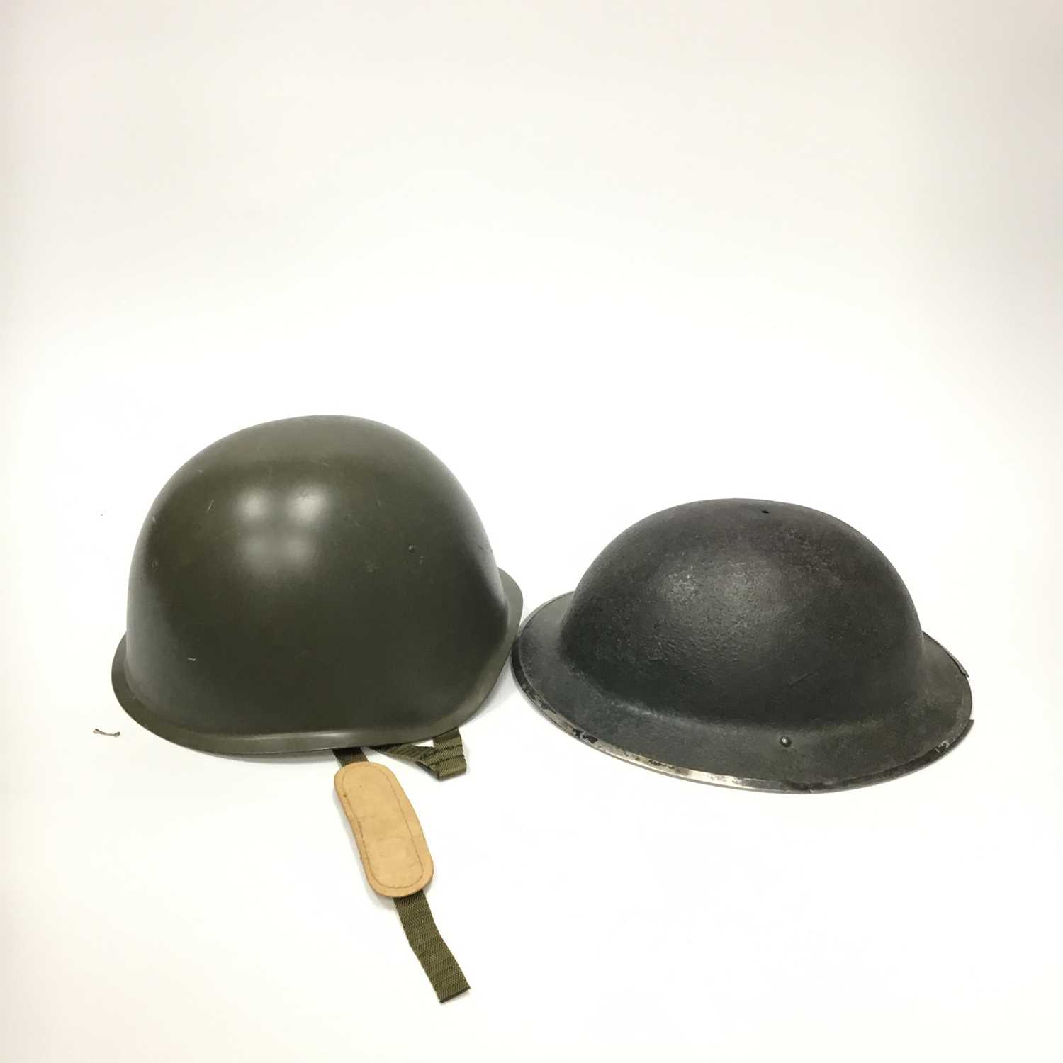 Lot 1393 - A BRITISH WWII TIN HAT ALONG WITH OTHER HATS