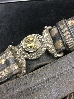 Lot 1400 - AN EARLY 19TH CENTURY AYRSHIRE YEOMANRY OFFICER’S LEATHER SABRETACHE ALONG WITH TWO WAIST BELTS