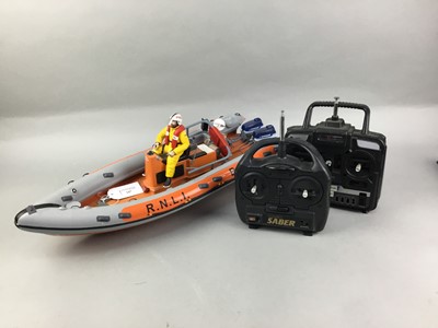 Lot 247 - A REMOTE CONTROL POND BOAT AND OTHER REMOTE CONTROLLERS