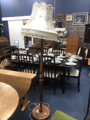 Lot 71 - A STAINED WOOD STANDING LAMP