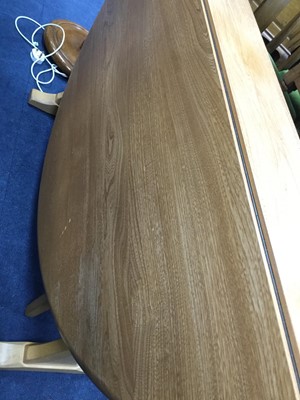 Lot 336 - AN ERCOL DROP LEAF DINING TABLE