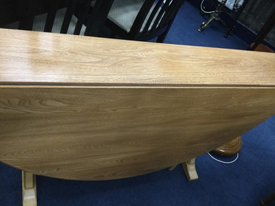 Lot 336 - AN ERCOL DROP LEAF DINING TABLE