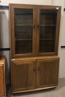 Lot 347 - AN ERCOL BOOKCASE