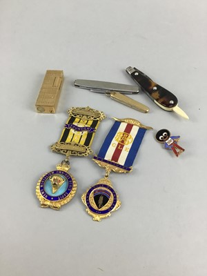 Lot 283 - A LOT OF TWO MASONIC MEDALS, POCKET KNIVES AND A LIGHTER