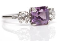 Lot 228 - PINK SAPPHIRE AND DIAMOND THREE STONE RING the...