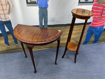 Lot 397 - A MAHOGANY DEMI LUNE TABLE AND A MAHOGANY TWO TIER PLANT STAND