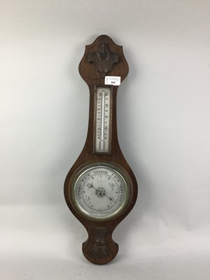 Lot 508 - AN OAK CASED ANEROID BAROMETER