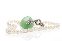 Lot 272 - PEARL NECKLACE WITH HARDSTONE DROP formed by...