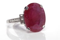Lot 278 - IMPRESSIVE RUBY AND DIAMOND RING the central...