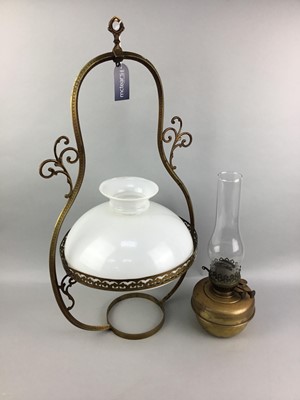 Lot 552 - A VICTORIAN BRASS HANGING OIL LAMP