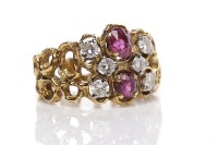 Lot 294 - 1970s RUBY AND DIAMOND RING of openwork form,...