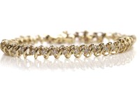 Lot 301 - DIAMOND LINE BRACELET set with thirty eight...