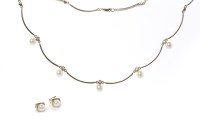 Lot 310 - PEARL AND DIAMOND NECKLACE set with round...