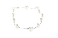 Lot 339 - MIKIMOTO EIGHTEEN CARAT WHITE GOLD AND PEARL...